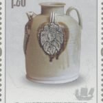 (4-2), Glazed Jug Molded with Brown Appliqued Date Palm Patterns from Changsha Kiln, Tang Dynasty, 120 fen, 30 * 40 mm